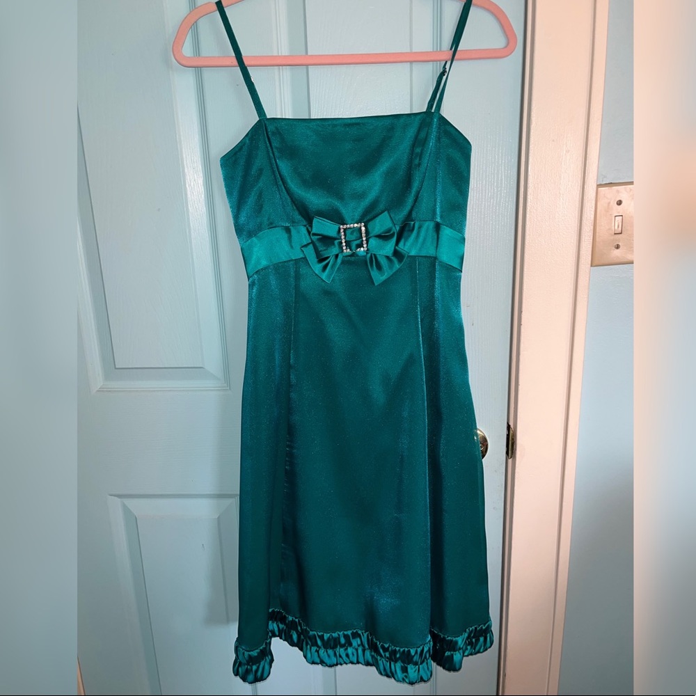 She’s teal dress